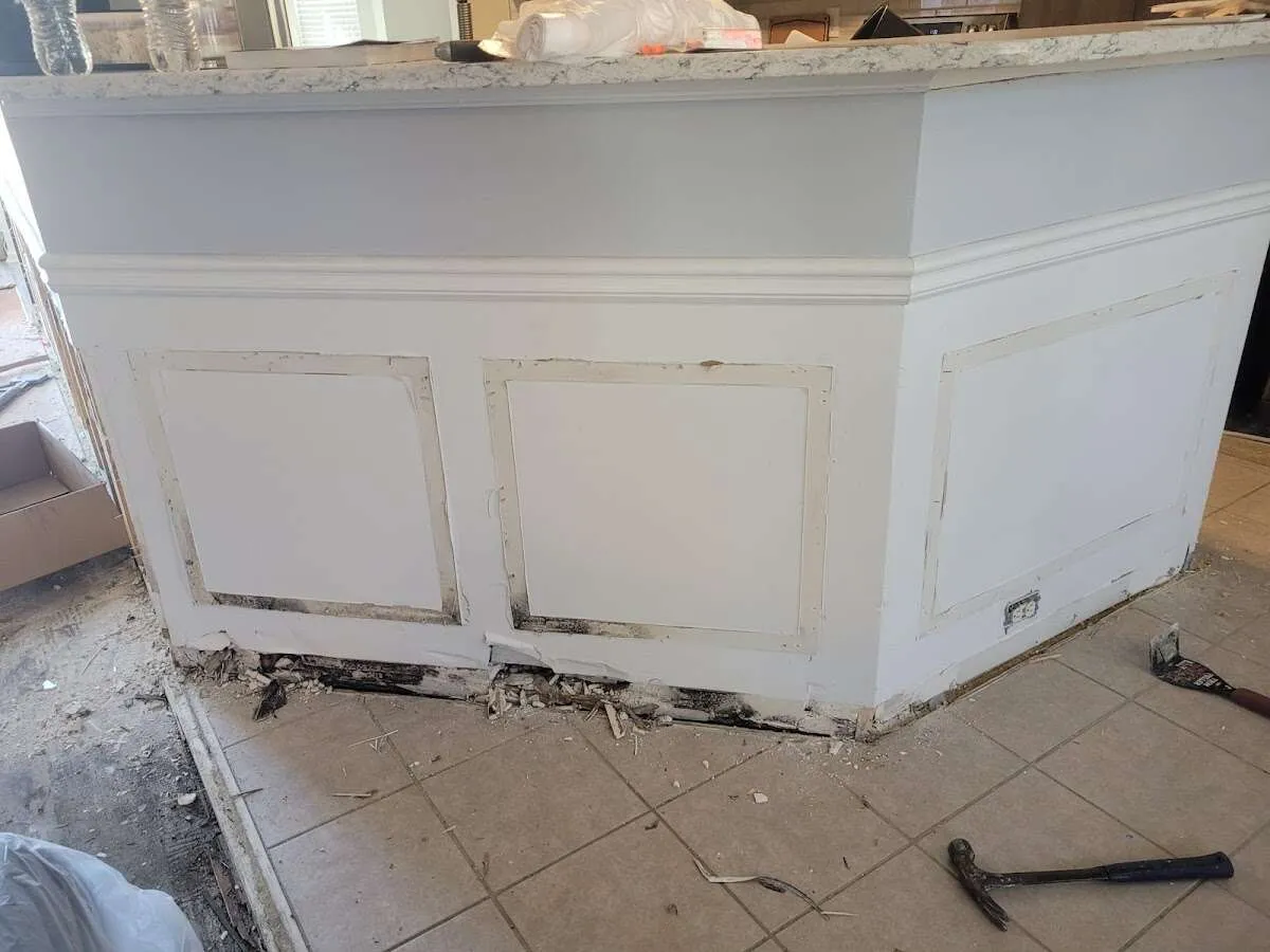 Water damage and mold on kitchen during Storm Damage Restoration in Cannon